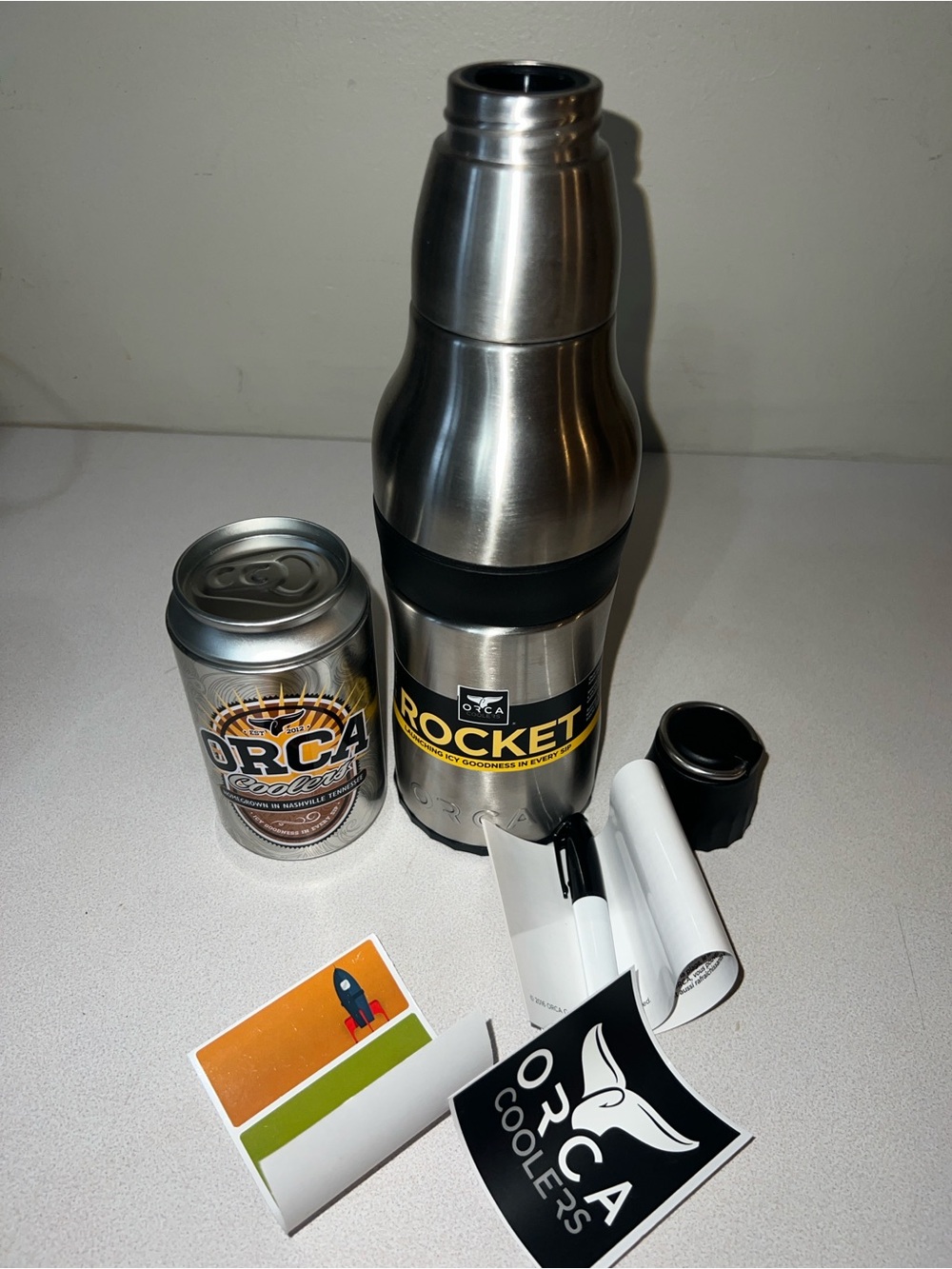 Orca Stainless Steel Insulated Bottle and can holder in Silver and Black Rocket